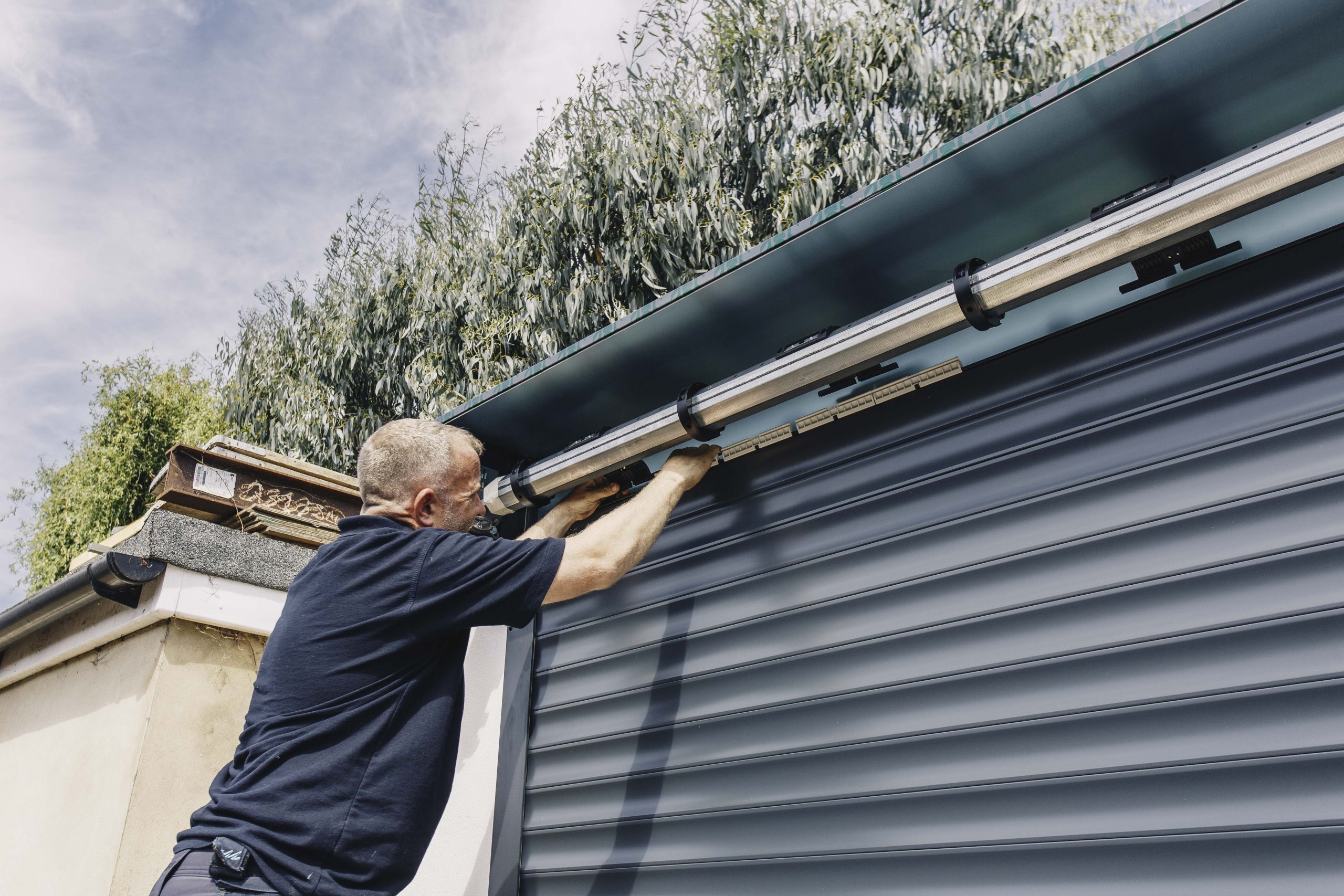 Roller garage door being installed