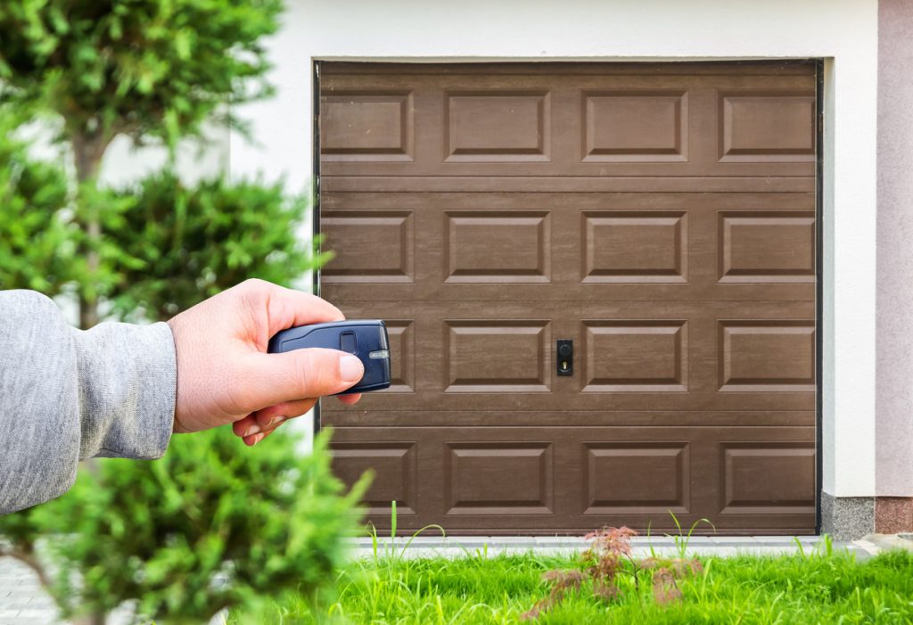 Hand use remote controller for closing and opening garage door